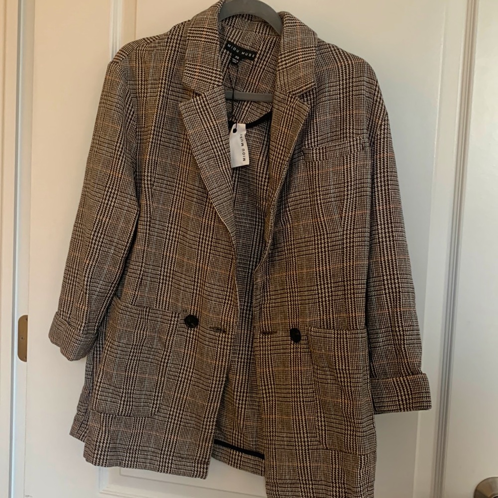 Brown checkered blazer with orange & blue accents